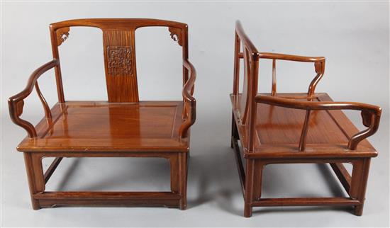 A pair of Chinese hardwood low open armchairs, W.76.5cm H.81cm